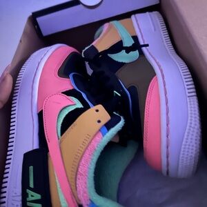 Nike Pink and Yellow Sneakers Vibrant Design